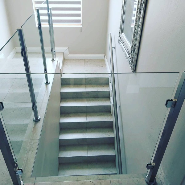 Glass and steel ballustrades indoor stairs