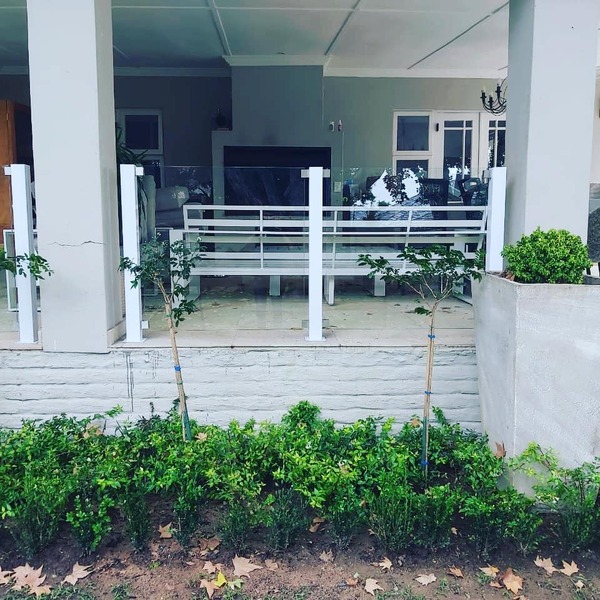 Glass and steel ballustrades garden